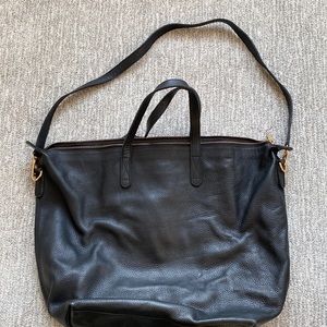 Cuyana leather travel bag.